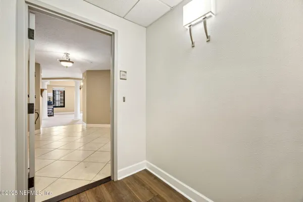 a view of a hallway with workspace