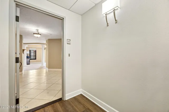 a view of a hallway with workspace