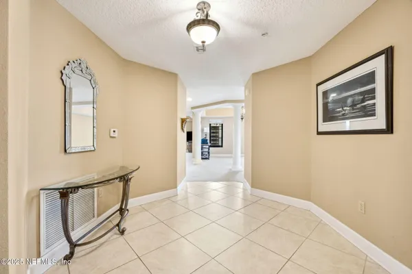 a view of a hallway with entryway
