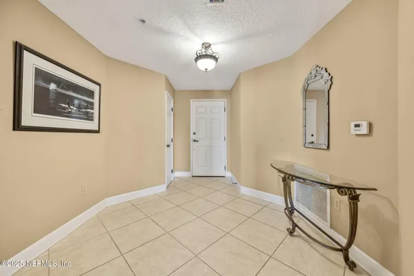 a view of livingroom with furniture and window