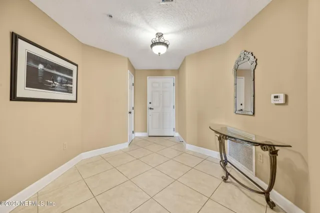 a view of livingroom with furniture and window