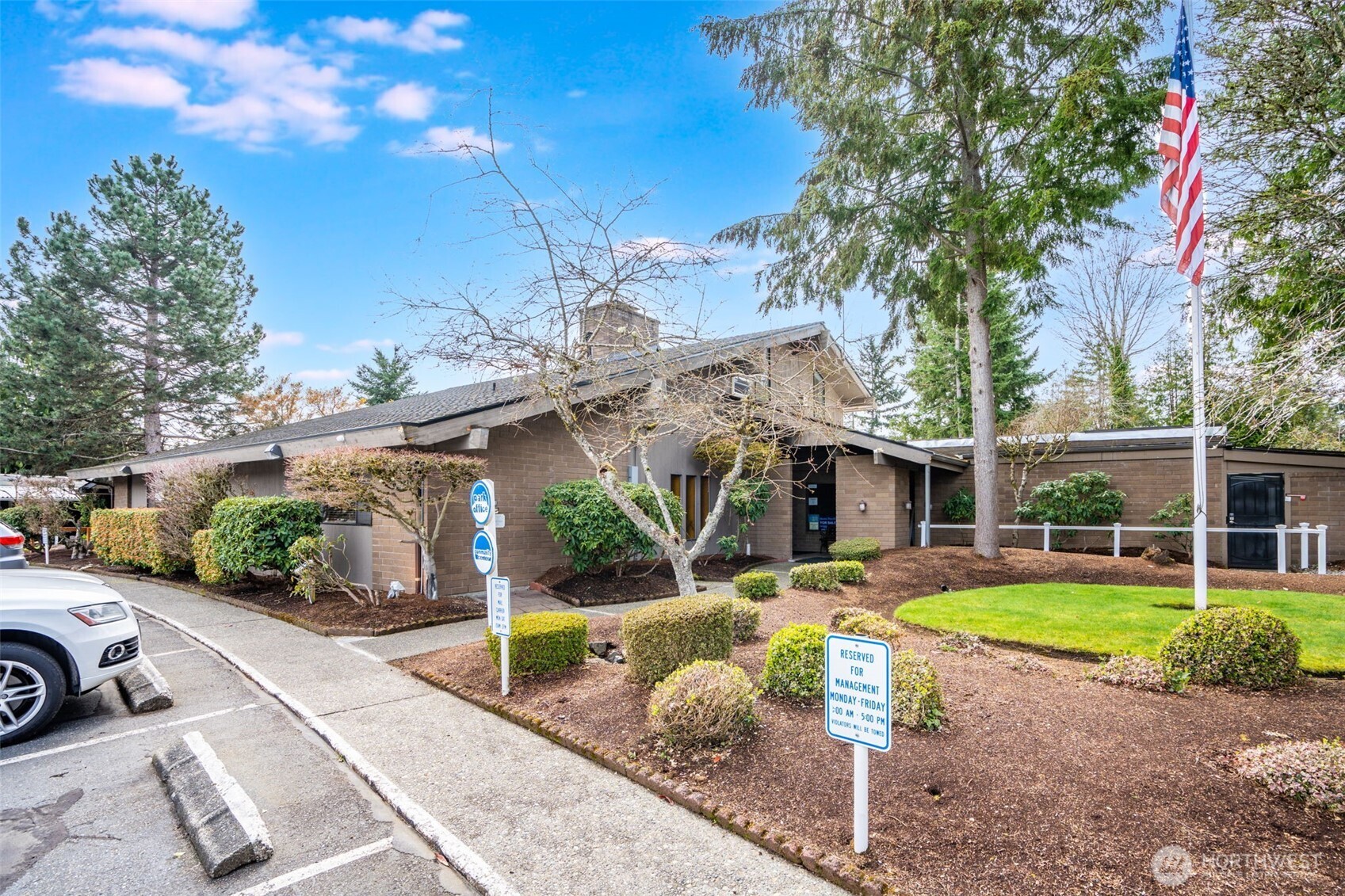 201 Union Avenue Southeast, Unit 111 Renton, WA 98059 - Photo 32 of 40 a view of a house with swimming pool and a yard