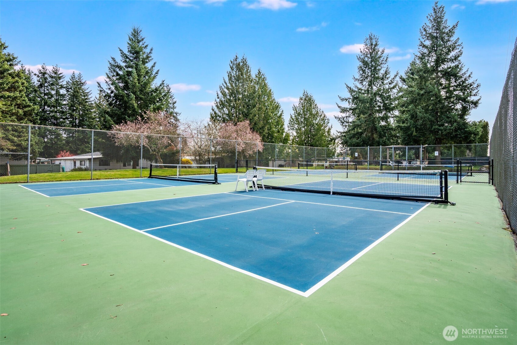 201 Union Avenue Southeast, Unit 111 Renton, WA 98059 - Photo 36 of 40 a view of a tennis court