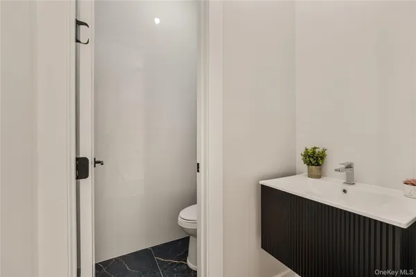 a bathroom with a sink and a toilet