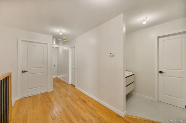 a bathroom with a shower and a sink