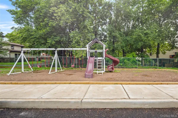 a view of a park with a slide