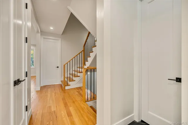 a view of entryway with wooden floor