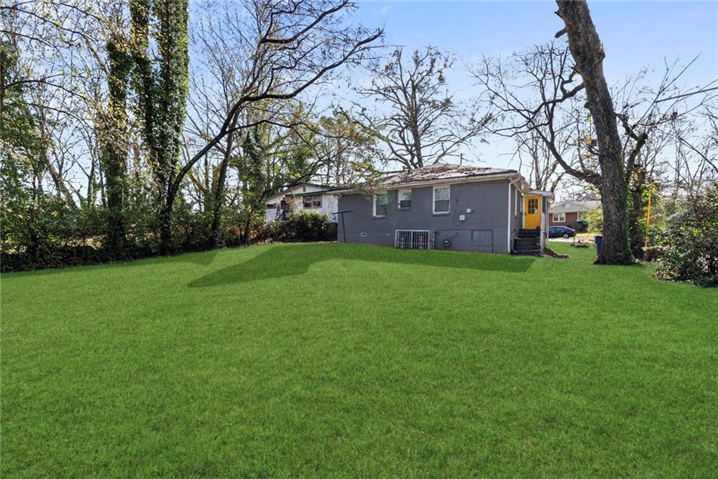 200 Meador Way Southeast Atlanta, GA 30315 - Photo 4 of 6 a view of a house with a yard