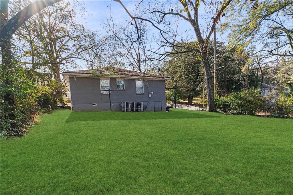 200 Meador Way Southeast Atlanta, GA 30315 - Photo 5 of 6 a view of a house with a yard