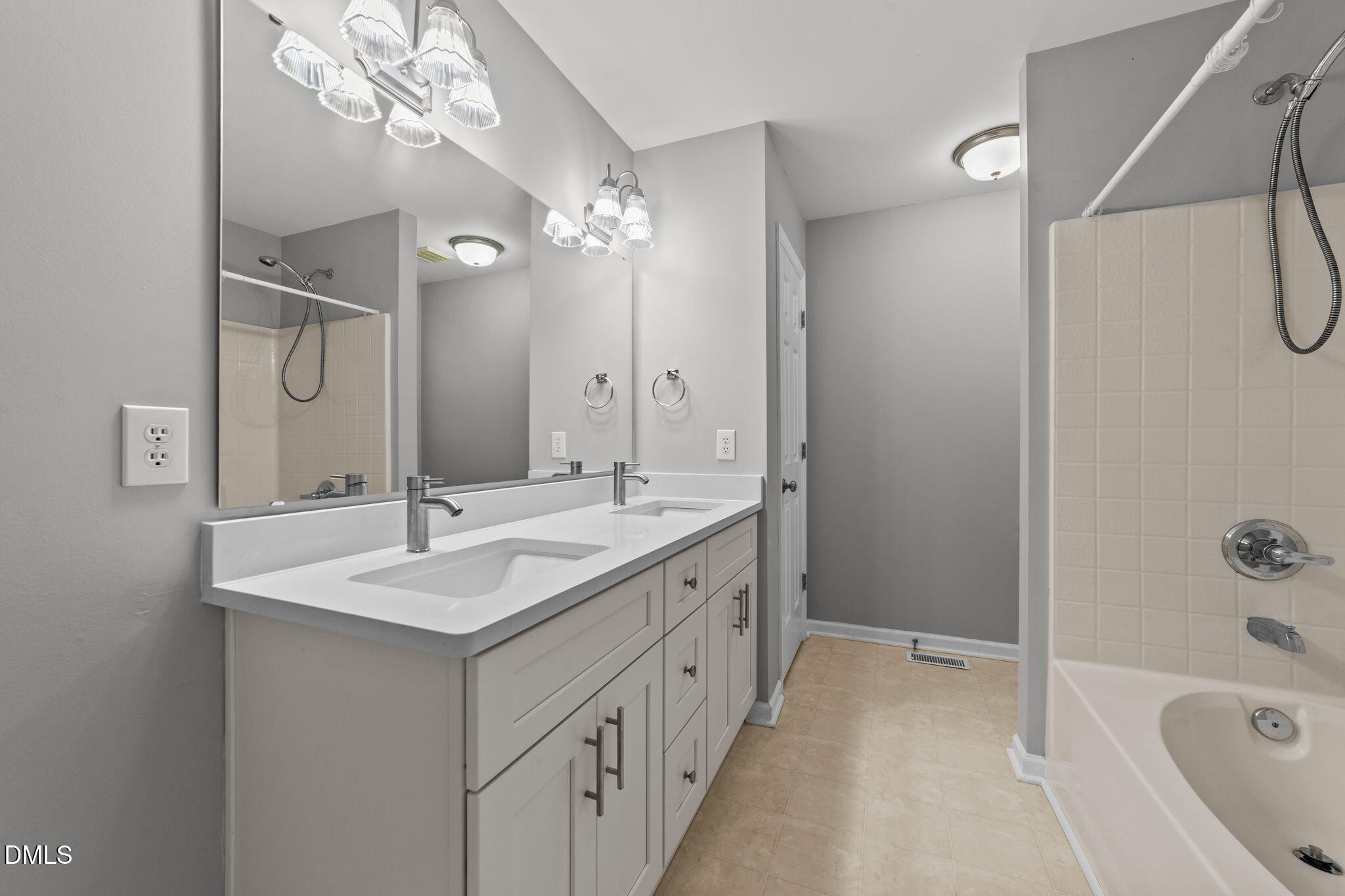 1275 Smith Road Smithfield, NC 27577 - Photo 19 of 41 a bathroom with a tub a sink and mirror