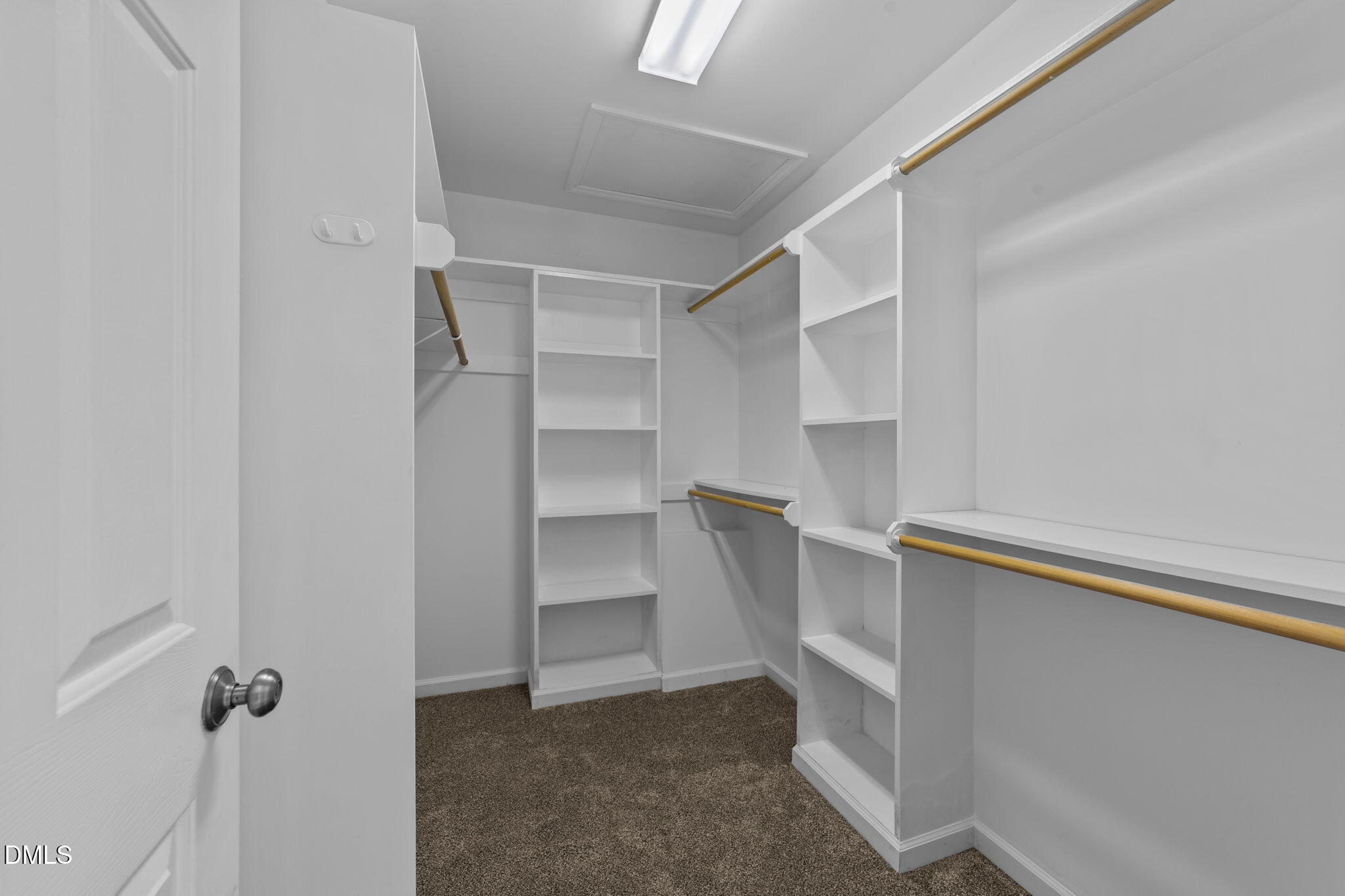 1275 Smith Road Smithfield, NC 27577 - Photo 23 of 41 a view of walk in closet with empty racks