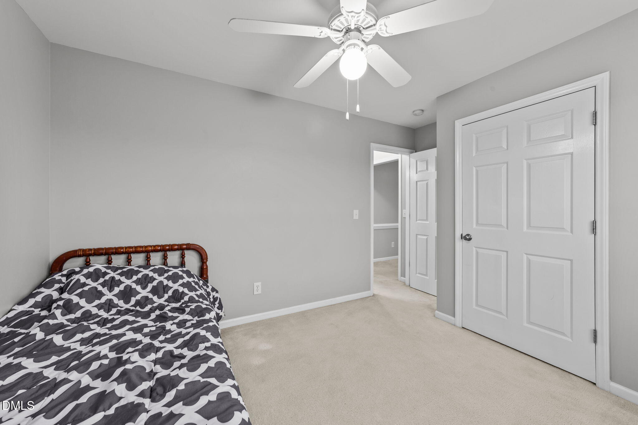 1275 Smith Road Smithfield, NC 27577 - Photo 25 of 41 a bedroom with a bed and a black walk in closet