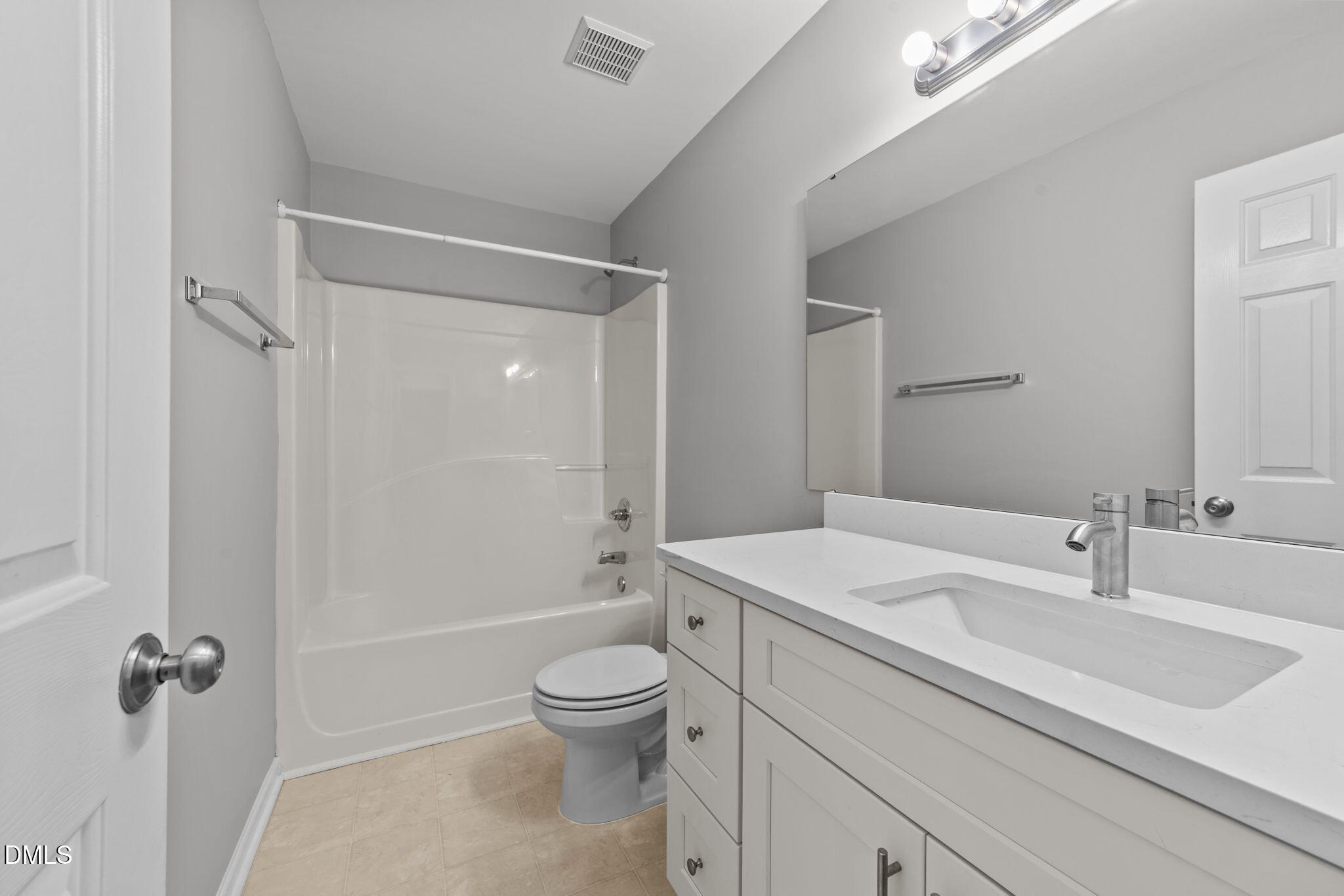 1275 Smith Road Smithfield, NC 27577 - Photo 26 of 41 a bathroom with a sink toilet and shower