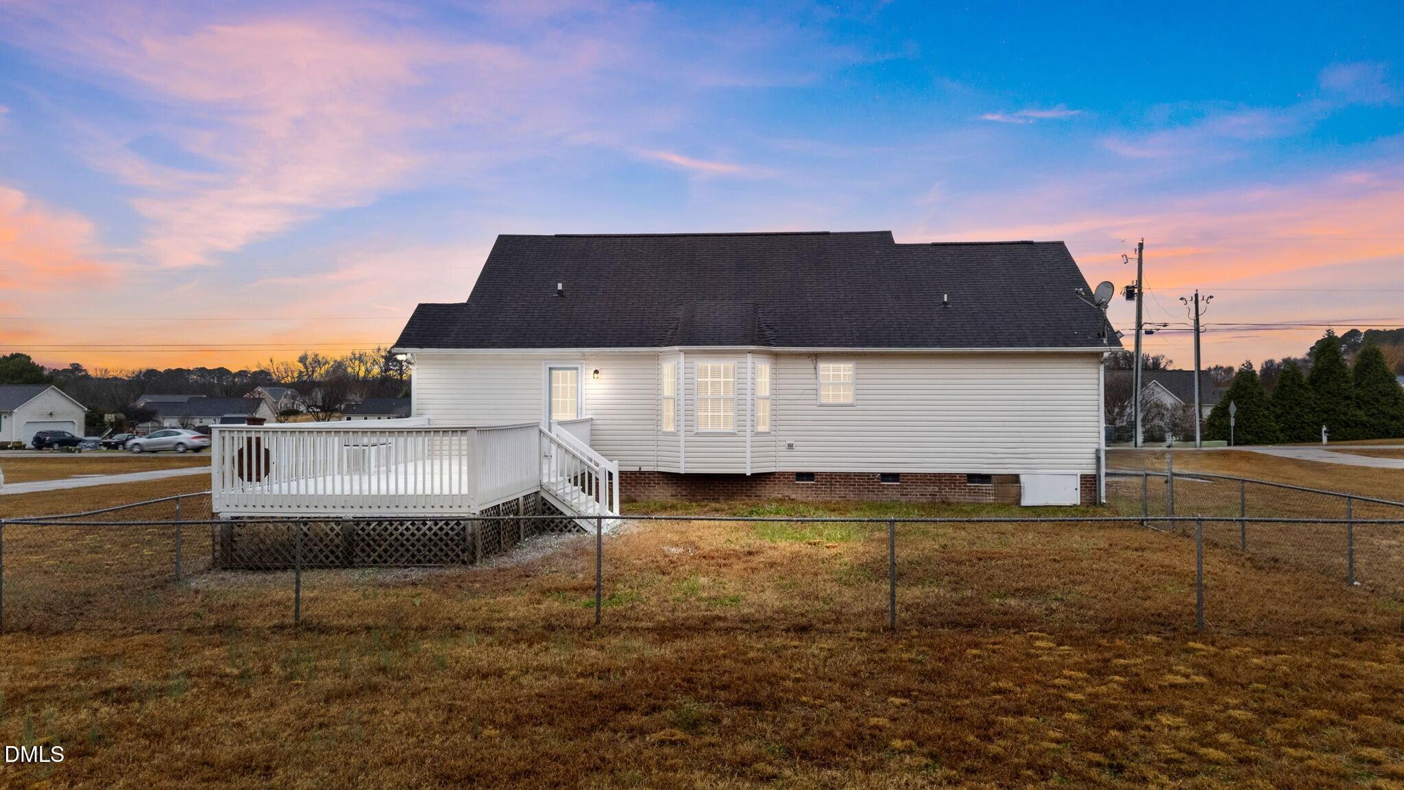 1275 Smith Road Smithfield, NC 27577 - Photo 2 of 41 a front view of a house with a yard
