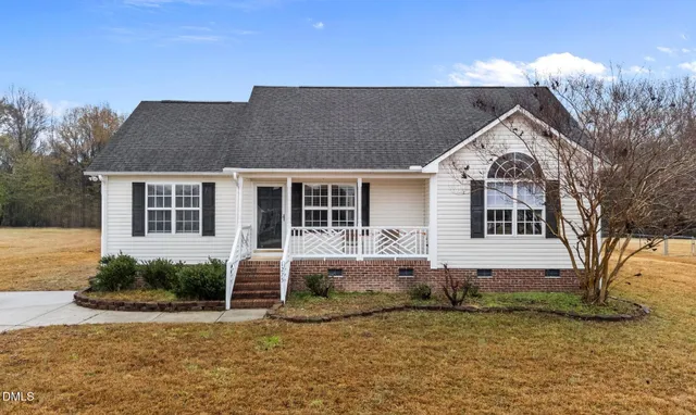 a view of a house with roof deck