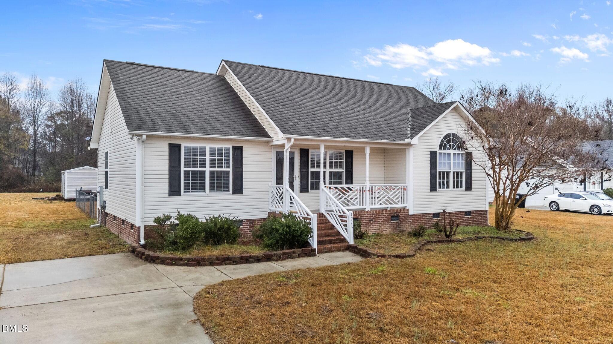1275 Smith Road Smithfield, NC 27577 - Photo 33 of 41 a front view of a house with a yard