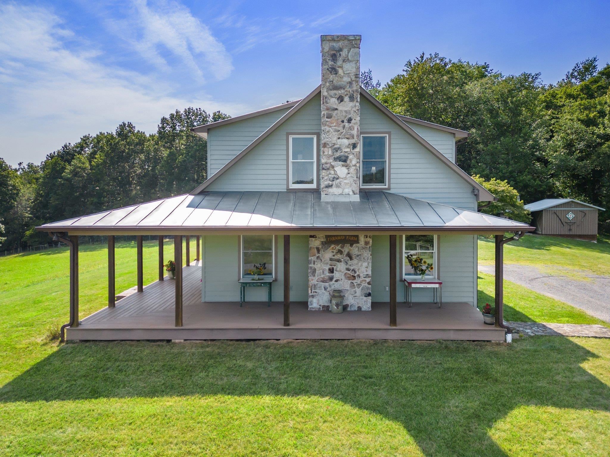 5237 Doe Hill Road McDowell, VA 24458 - Photo 14 of 75 a front view of a house with garden