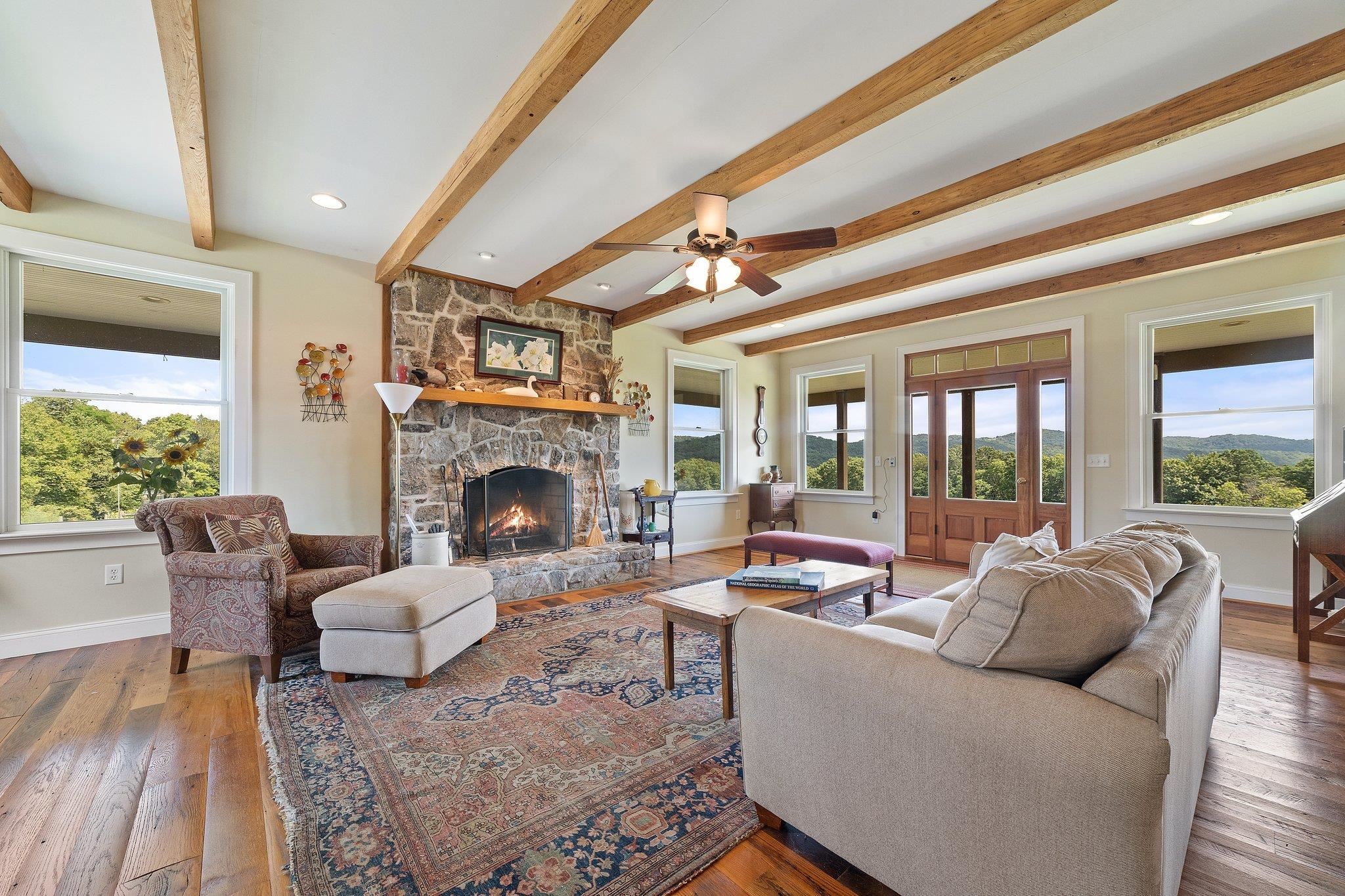 5237 Doe Hill Road McDowell, VA 24458 - Photo 30 of 75 a living room with furniture and a fireplace
