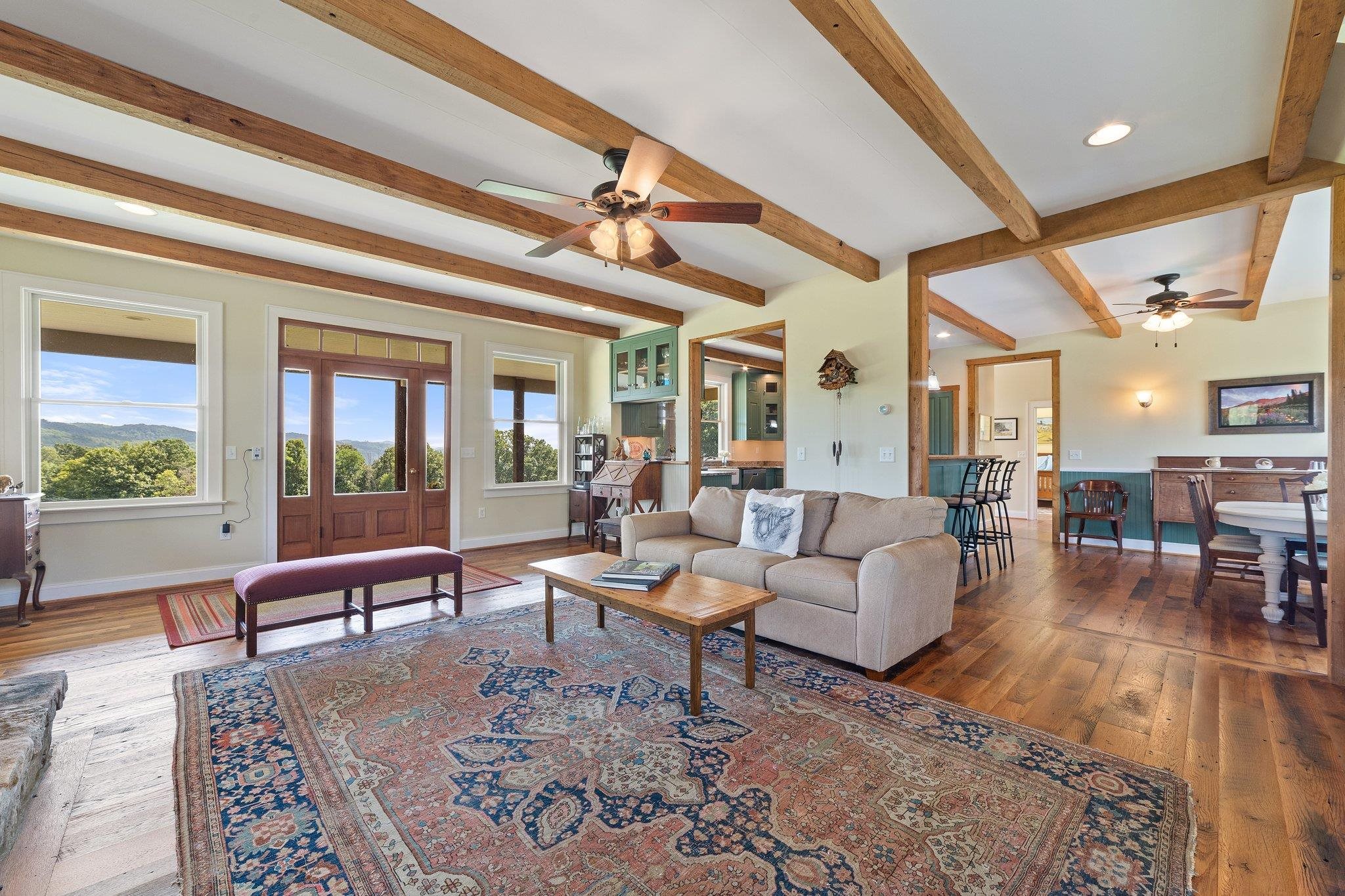 5237 Doe Hill Road McDowell, VA 24458 - Photo 31 of 75 a living room with furniture wooden floor and a table