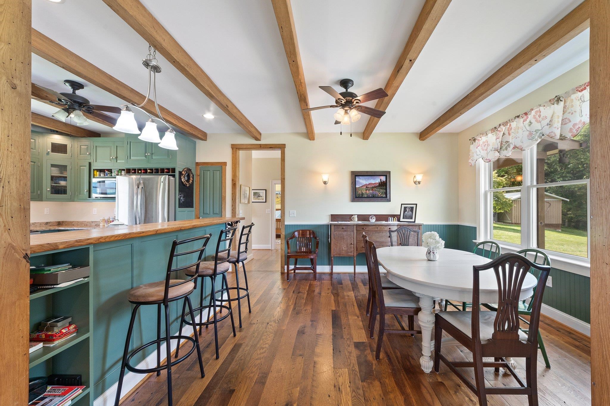 5237 Doe Hill Road McDowell, VA 24458 - Photo 33 of 75 a view of a dining room with furniture window and wooden floor
