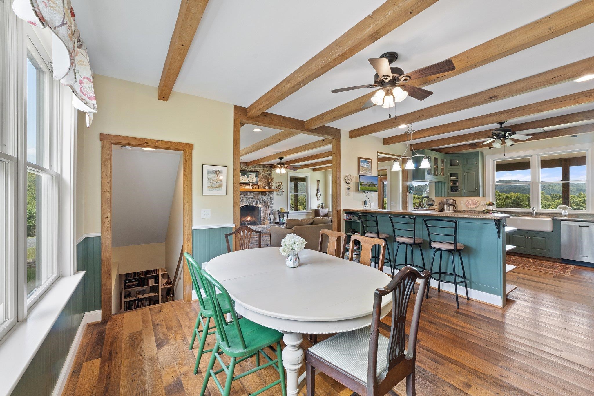 5237 Doe Hill Road McDowell, VA 24458 - Photo 34 of 75 a view of a dining room with furniture window and wooden floor