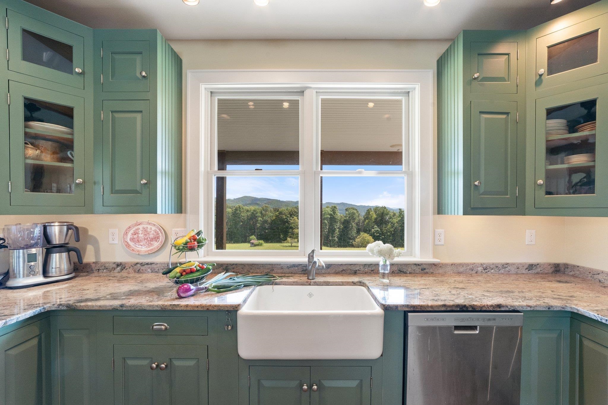 5237 Doe Hill Road McDowell, VA 24458 - Photo 37 of 75 a bathroom with a granite countertop sink and a window