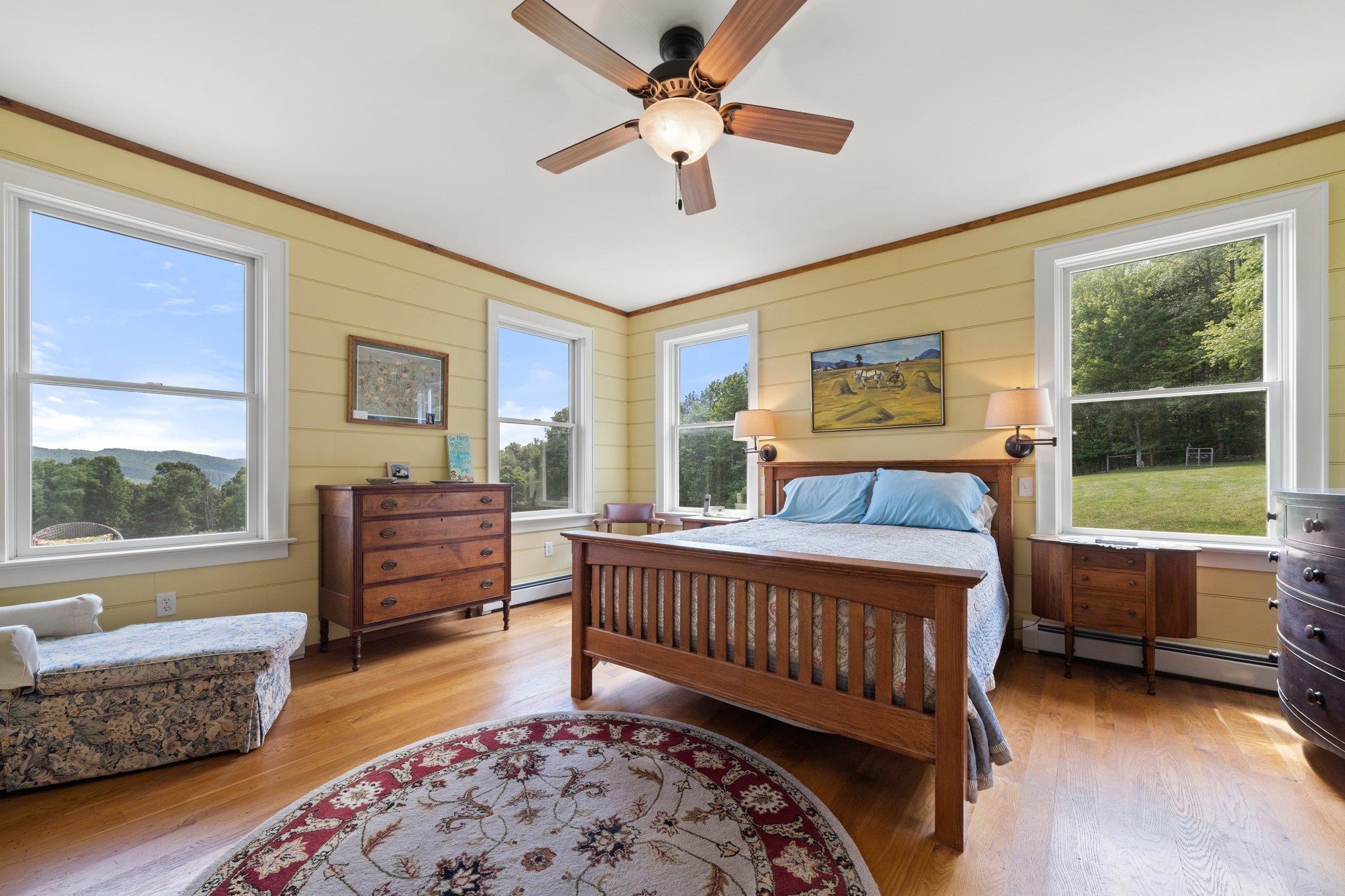 5237 Doe Hill Road McDowell, VA 24458 - Photo 41 of 75 a bedroom with a bed and wooden floor