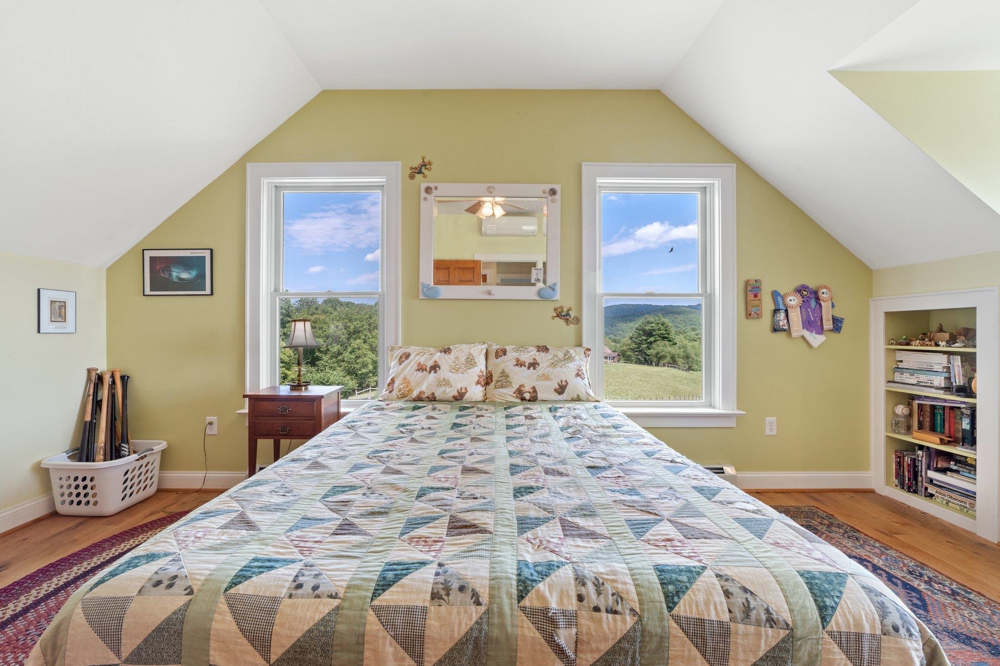 5237 Doe Hill Road McDowell, VA 24458 - Photo 49 of 75 a bedroom with a large bed and a window