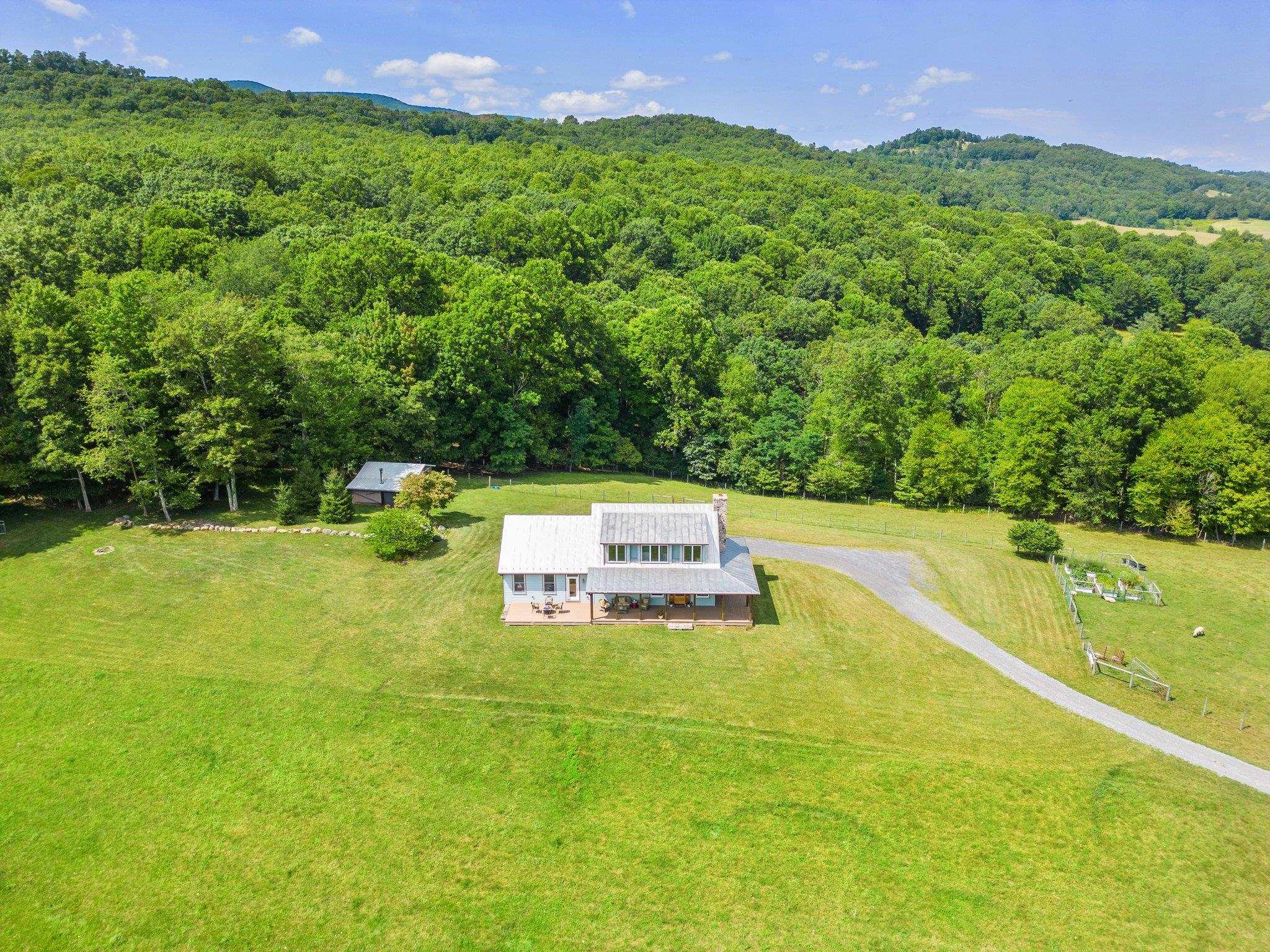 5237 Doe Hill Road McDowell, VA 24458 - Photo 5 of 75 a view of a swimming pool with a yard