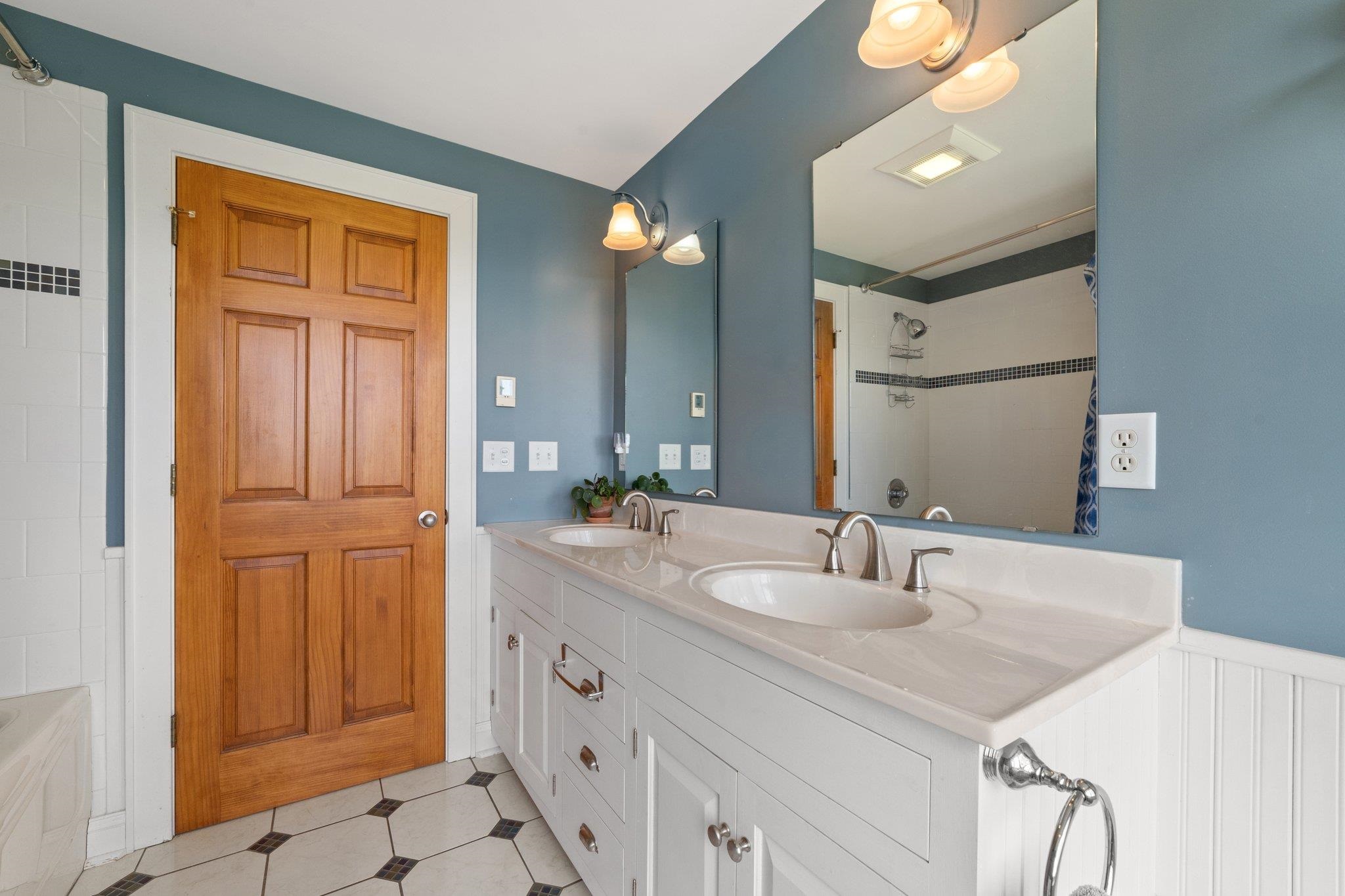 5237 Doe Hill Road McDowell, VA 24458 - Photo 55 of 75 a bathroom with a sink and a mirror