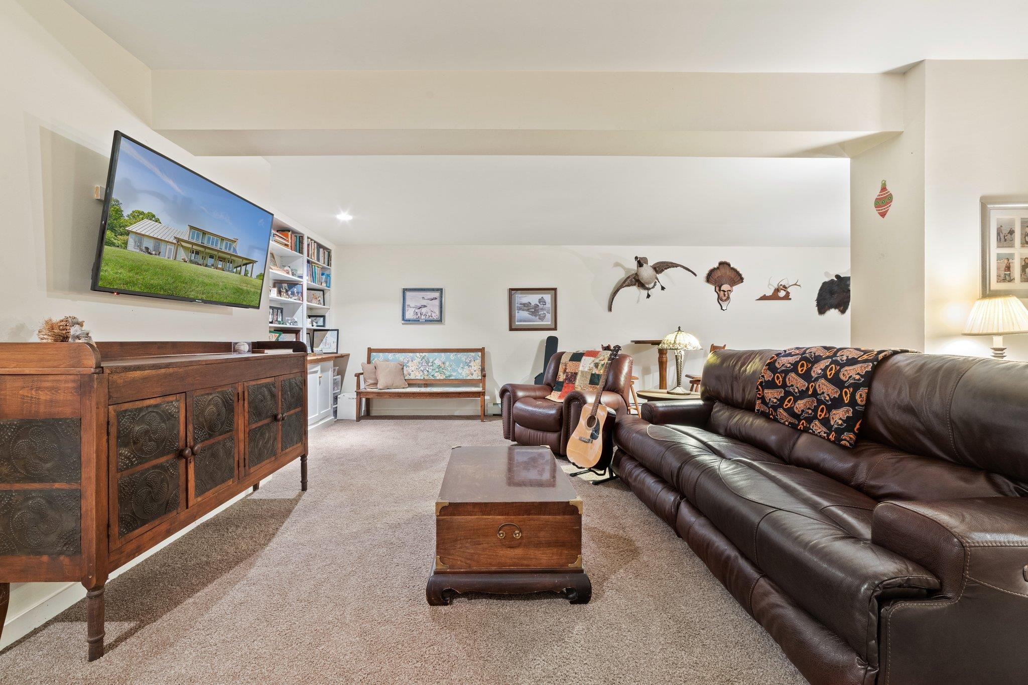 5237 Doe Hill Road McDowell, VA 24458 - Photo 61 of 75 a living room with furniture and a flat screen tv