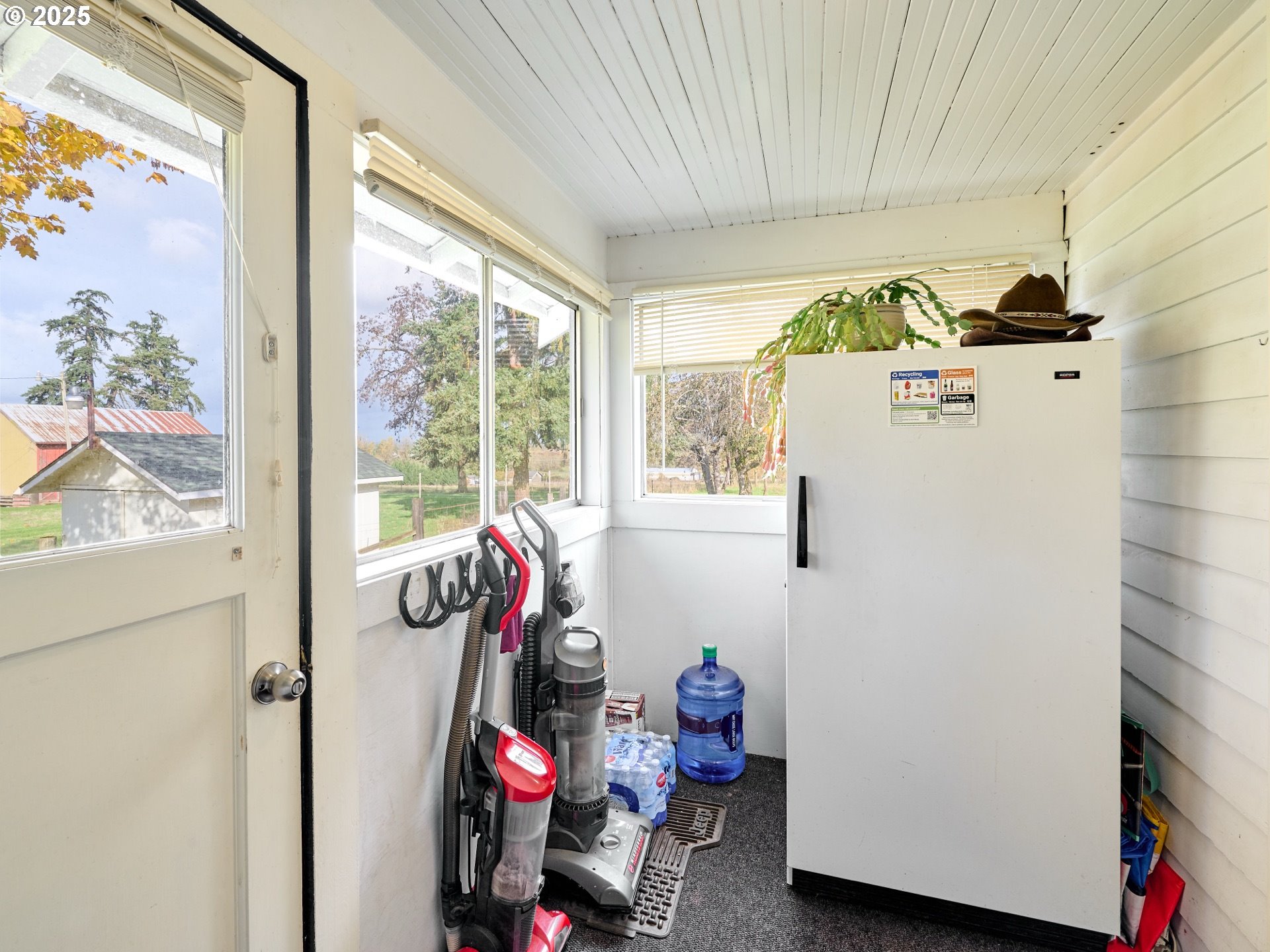 13595 South Warrick Road Molalla, OR 97038 - Photo 22 of 48 a view of a room with gym equipment and a large window