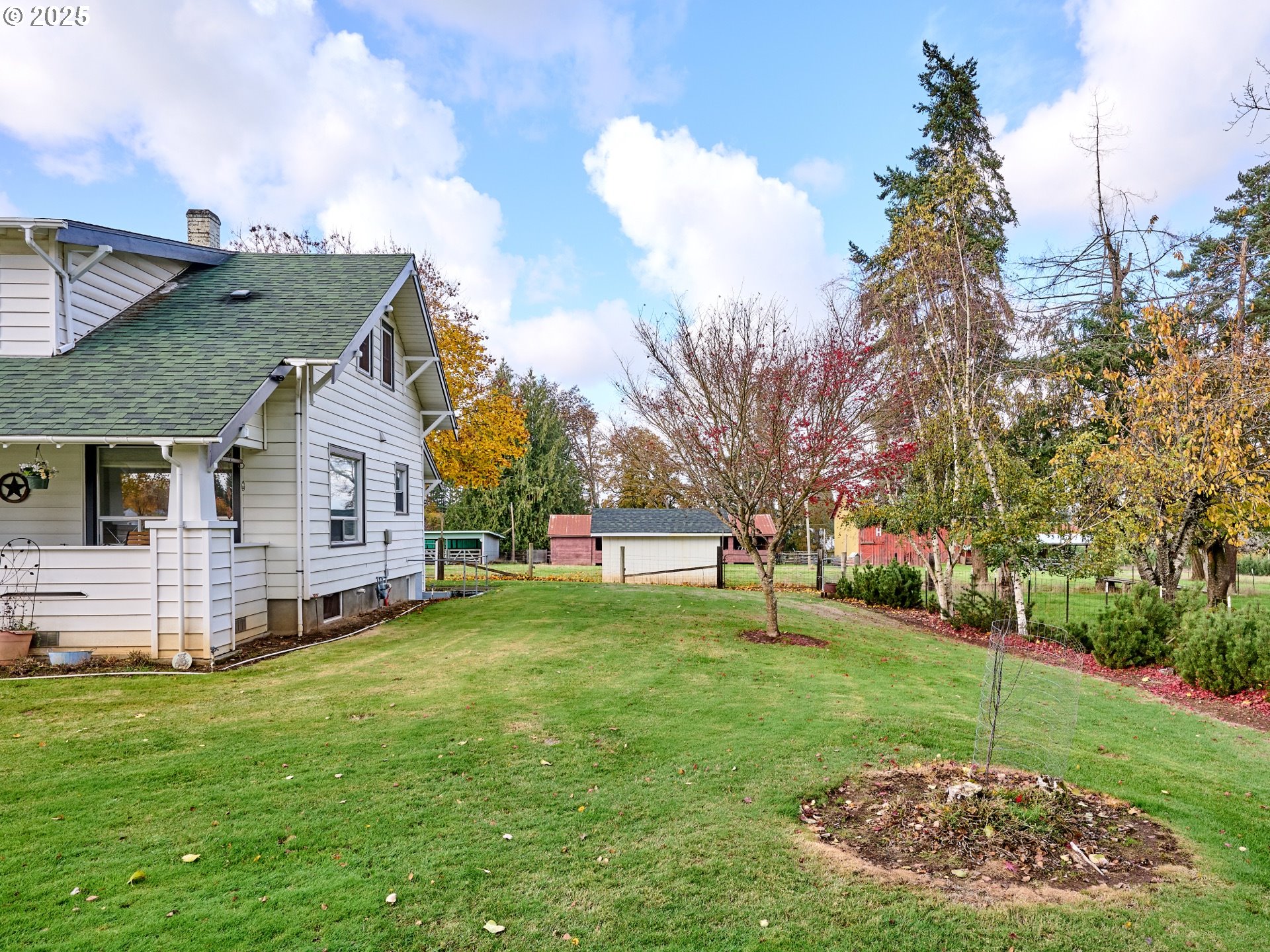 13595 South Warrick Road Molalla, OR 97038 - Photo 25 of 48 a view of a house with a yard