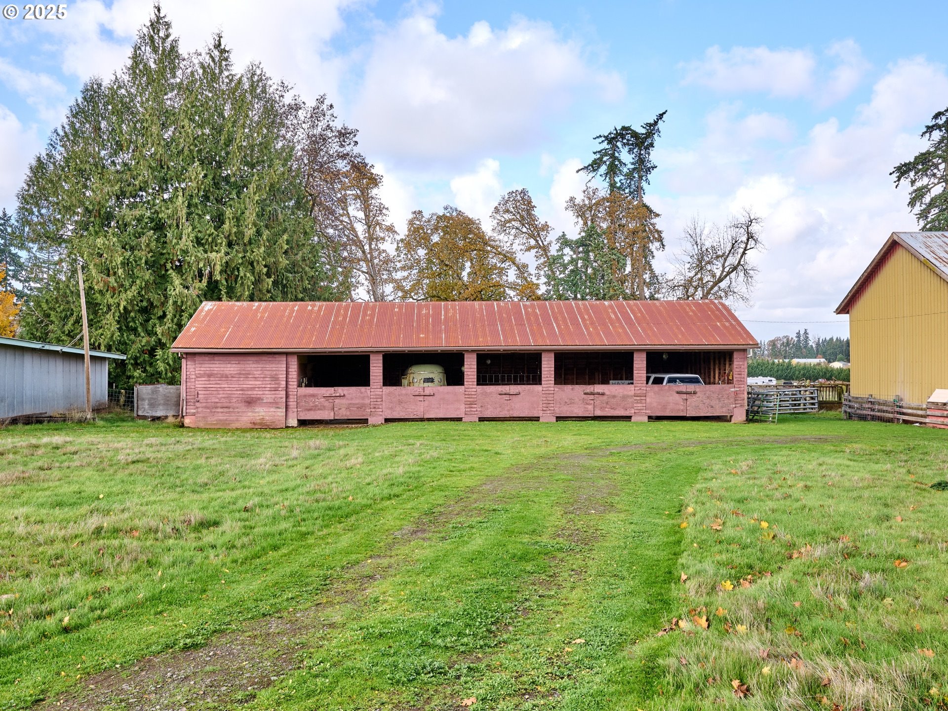 13595 South Warrick Road Molalla, OR 97038 - Photo 30 of 48 a view of a house with a backyard