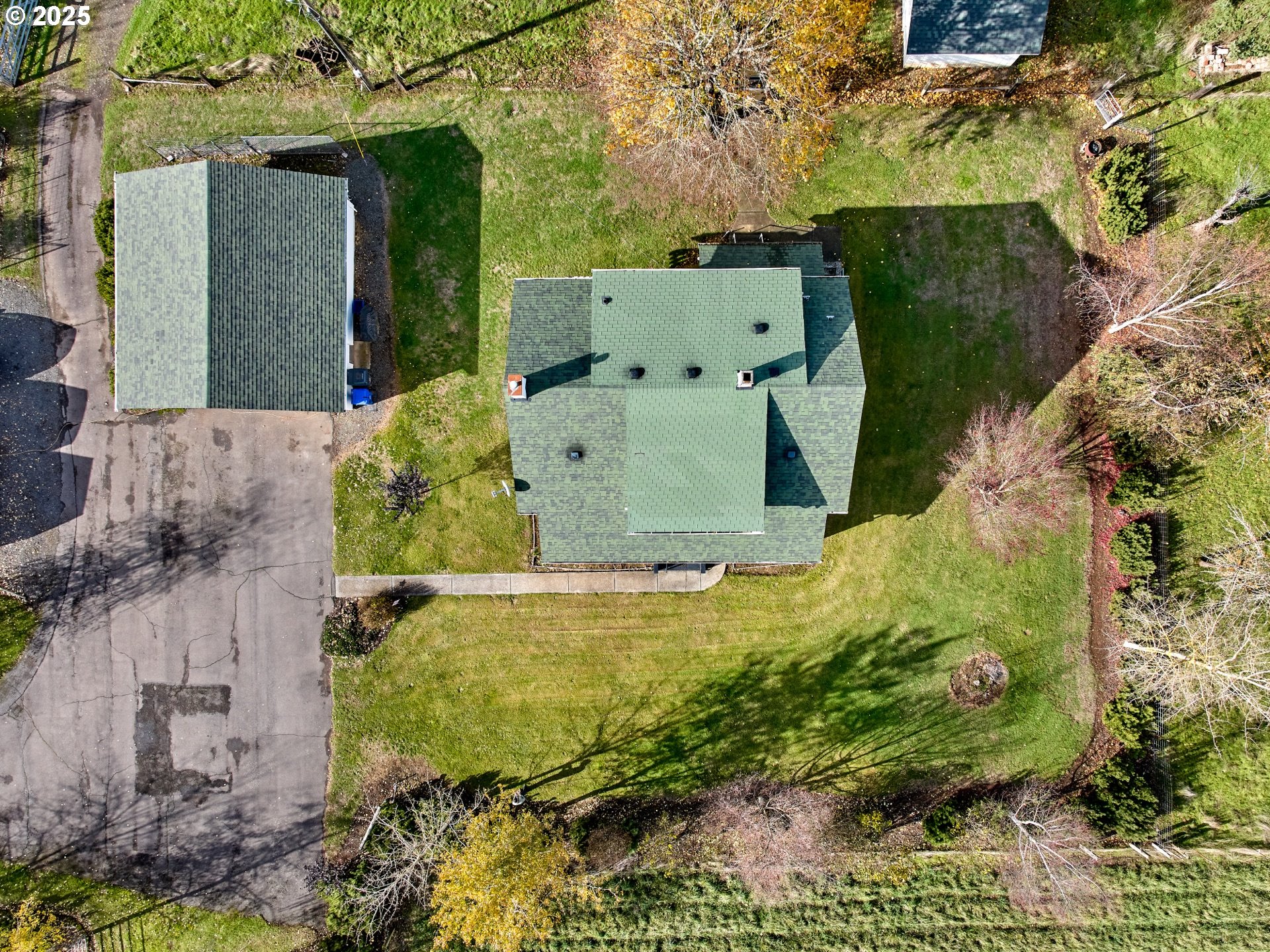 13595 South Warrick Road Molalla, OR 97038 - Photo 42 of 48 an aerial view of a house with a yard