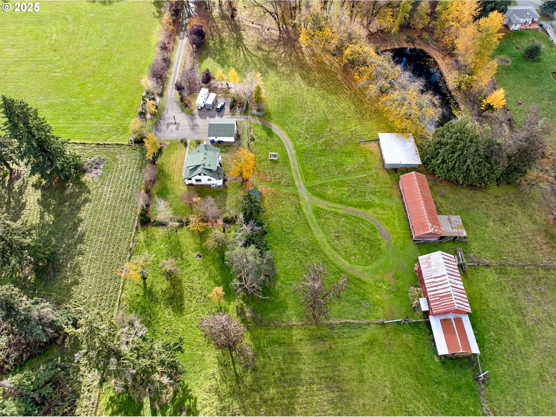 13595 South Warrick Road Molalla, OR 97038 - Photo 44 of 48 an aerial view of residential houses with outdoor space