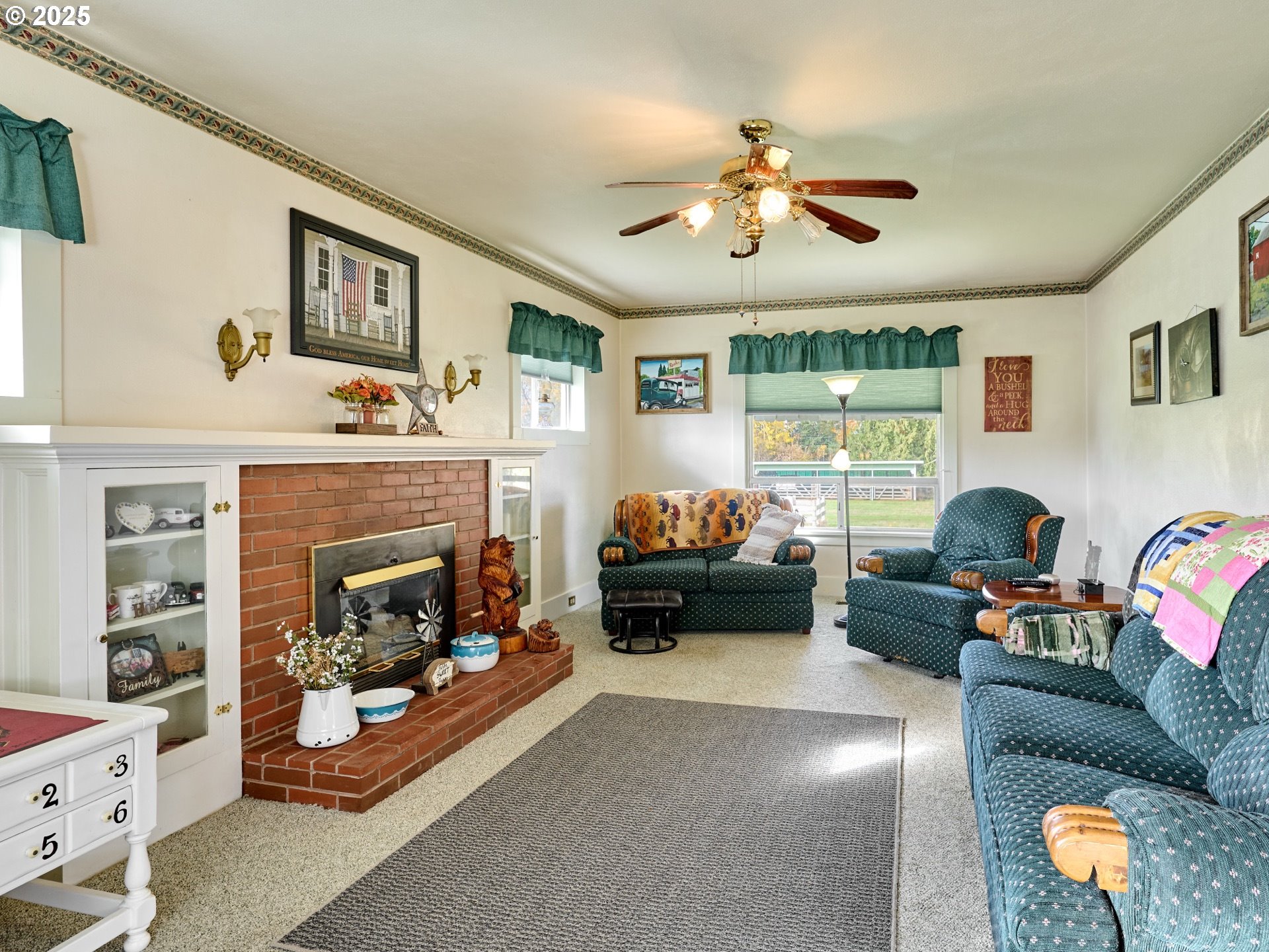 13595 South Warrick Road Molalla, OR 97038 - Photo 5 of 48 a living room with furniture and a fireplace