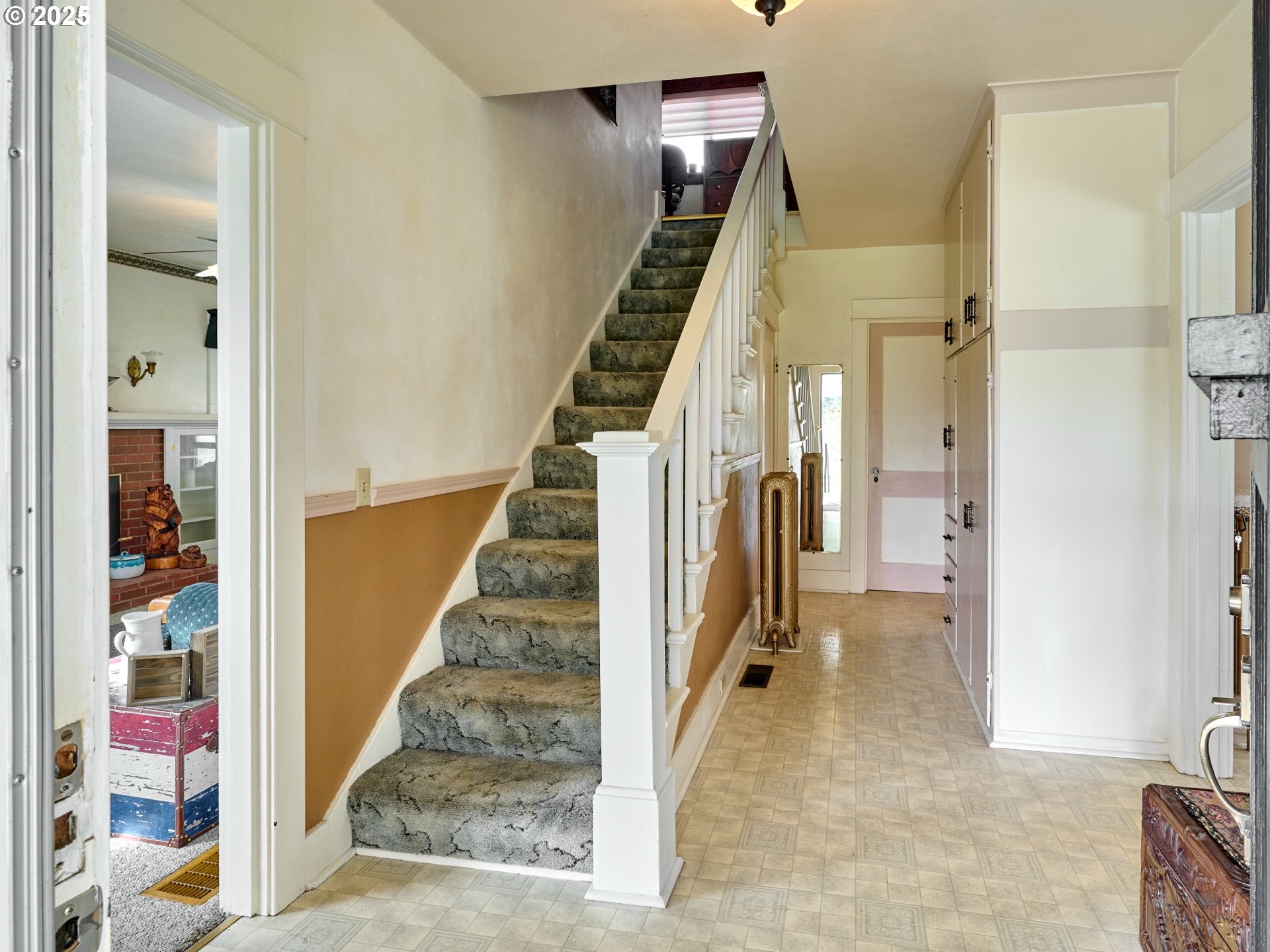 13595 South Warrick Road Molalla, OR 97038 - Photo 6 of 48 a view of a hallway with paintings on the wall