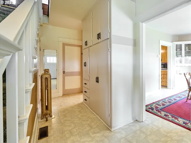 a view of a bathroom with a tub and shower