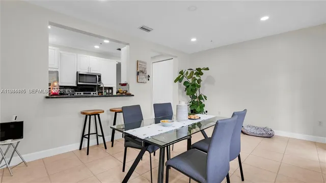 a view of a dining room with furniture
