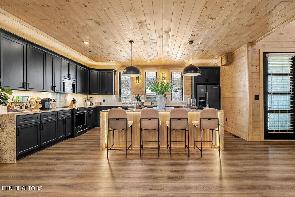 1620 Bear Valley Road Sevierville, TN 37876 - Photo 25 of 60 a large room with lots of counter space and chandelier
