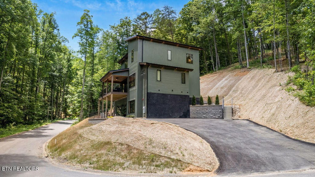 1620 Bear Valley Road Sevierville, TN 37876 - Photo 4 of 60 swimming pool view with a outdoor space