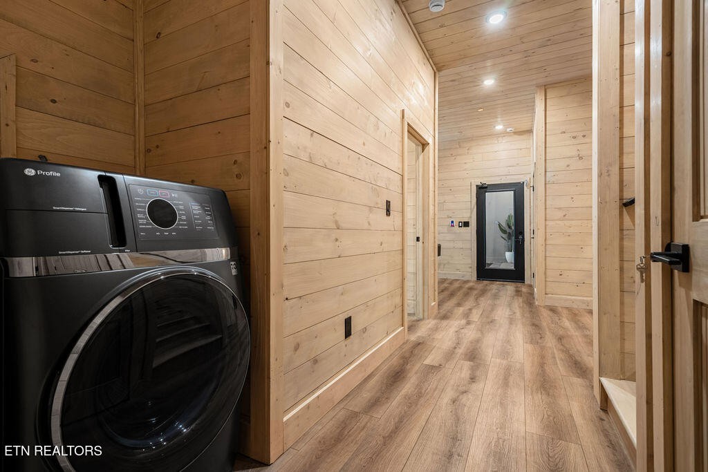 1620 Bear Valley Road Sevierville, TN 37876 - Photo 49 of 60 a view of a hallway with washer and dryer