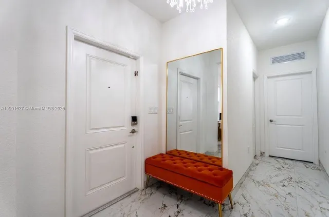 a room with a bed and a closet