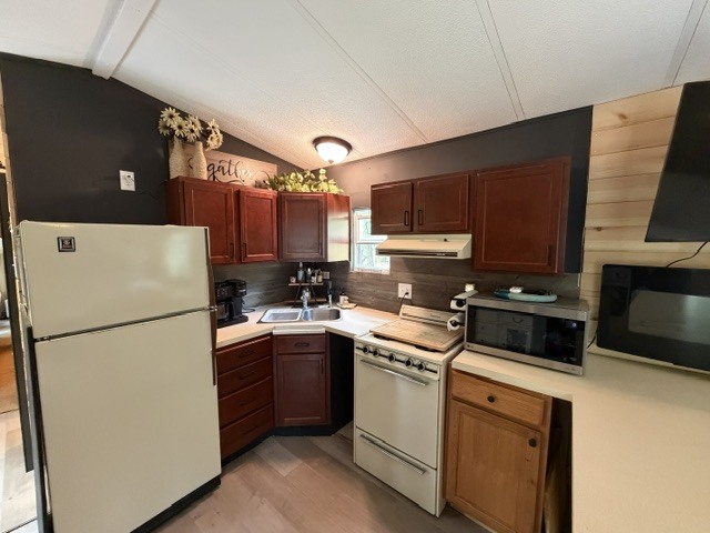 2795 East 28th Road Marseilles, IL 61341 - Photo 7 of 58 a kitchen with a refrigerator sink and microwave
