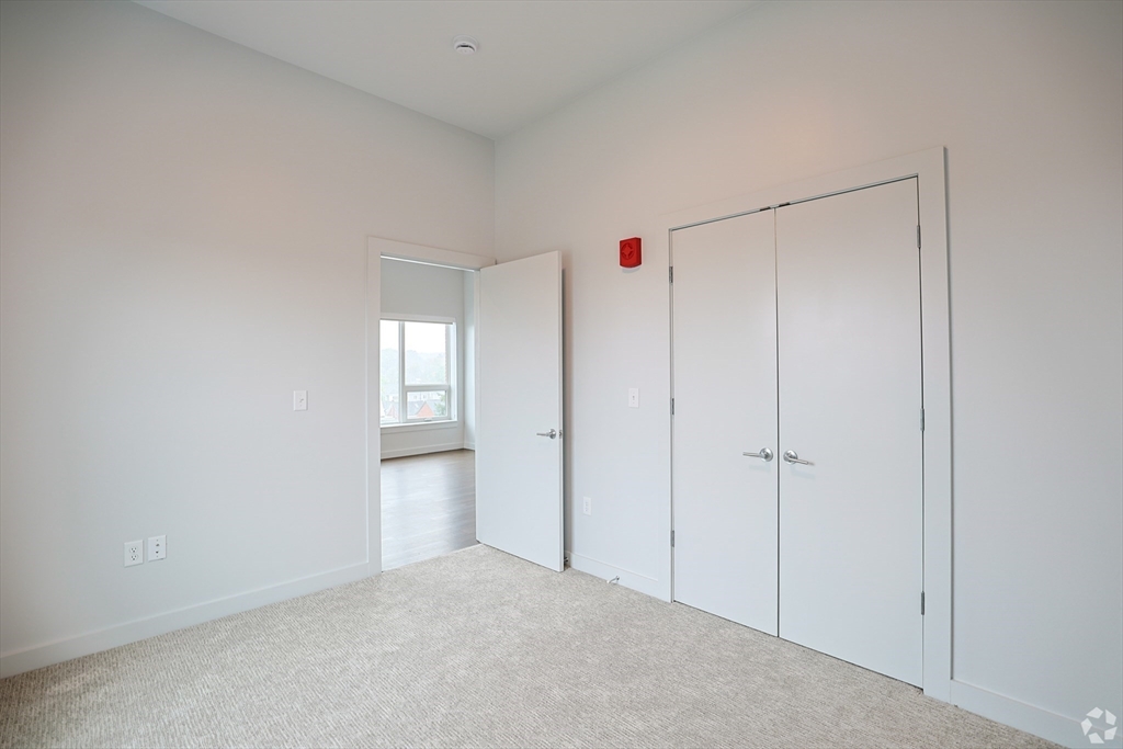 45 East Central Street, Unit 401 Natick, MA 01760 - Photo 5 of 16 a view of an empty room