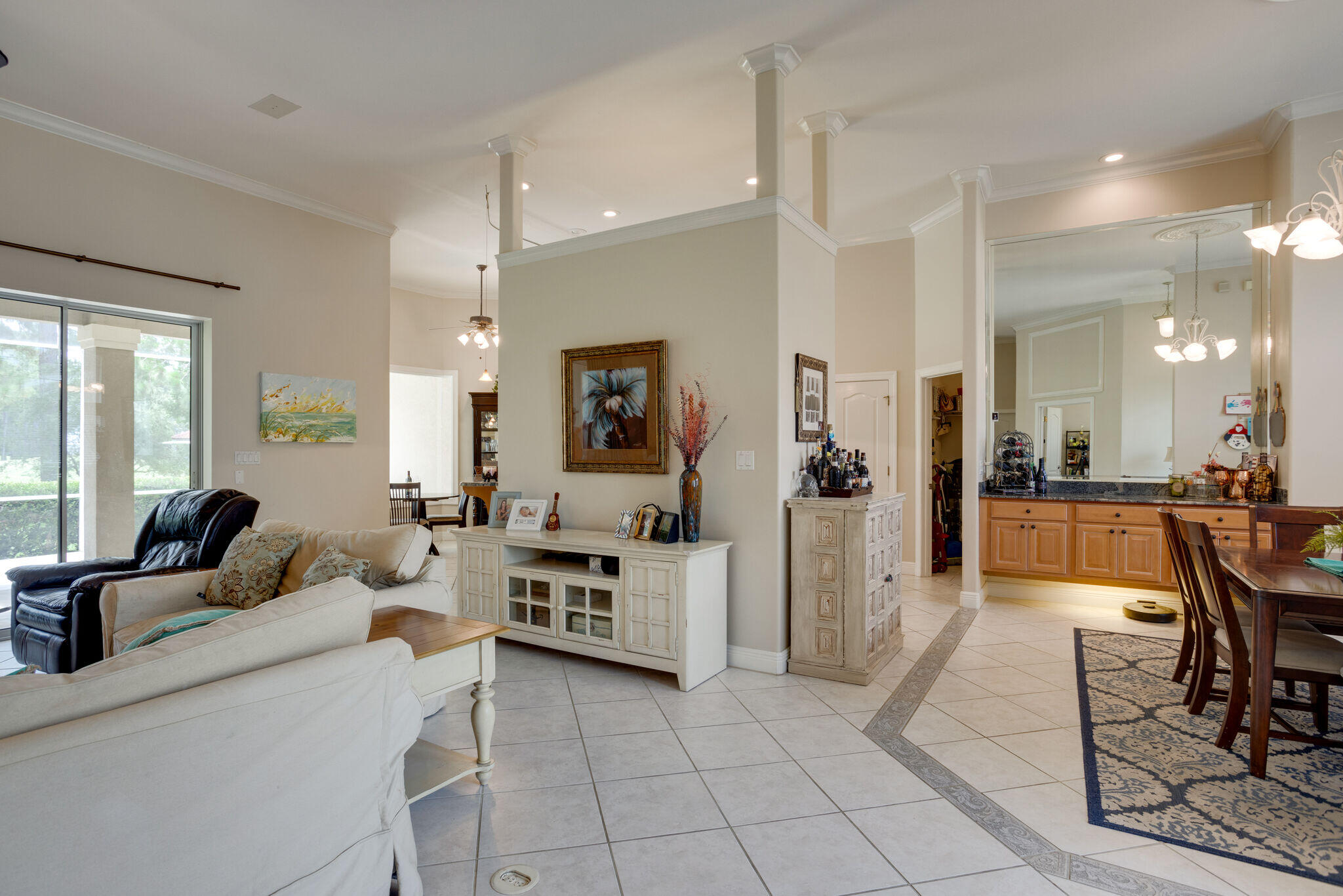 740 Indigo Loop Miramar Beach, FL 32550 - Photo 19 of 39 a living room with furniture and a dining table with kitchen view