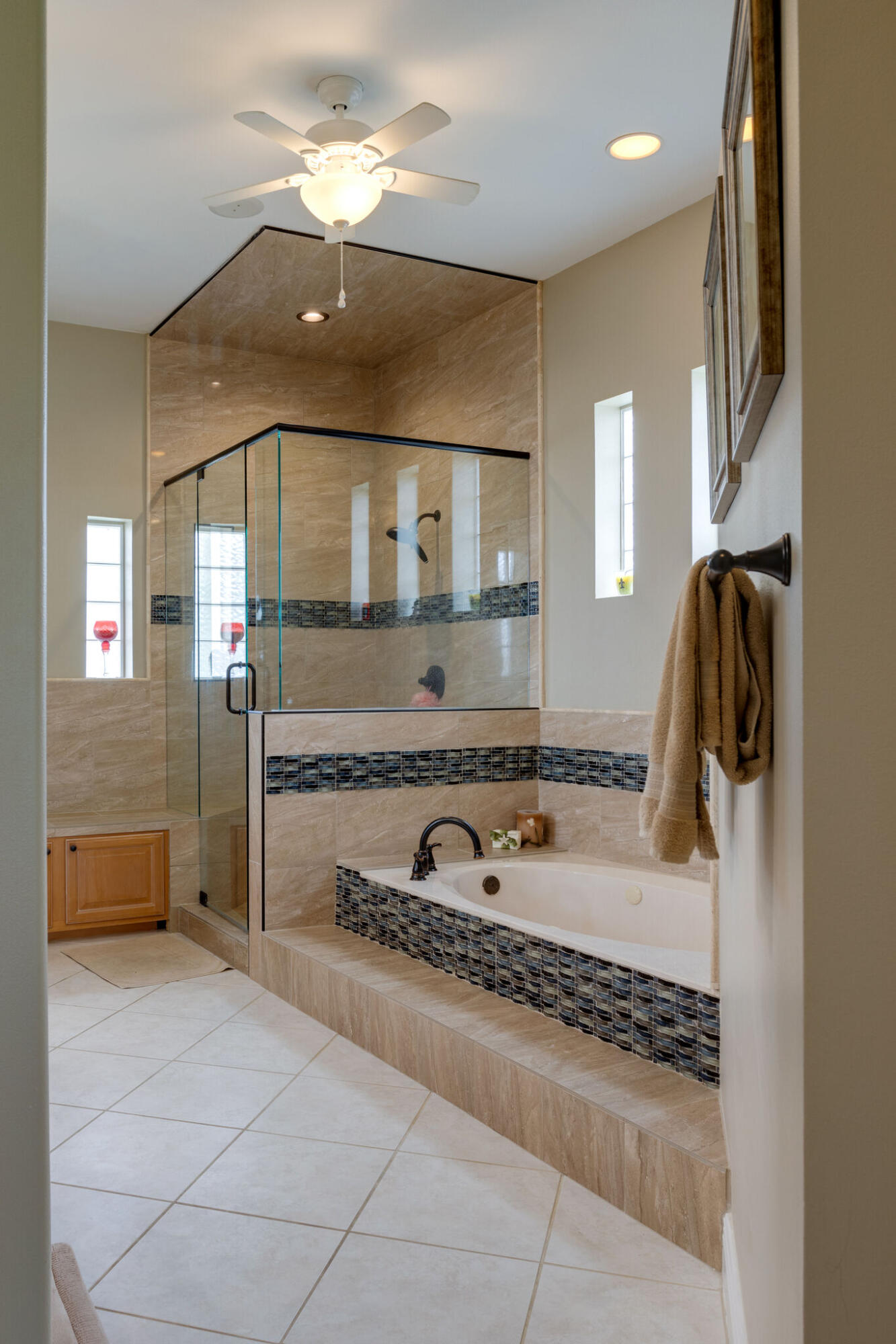 740 Indigo Loop Miramar Beach, FL 32550 - Photo 27 of 39 a bathroom with a granite countertop sink a mirror and shower