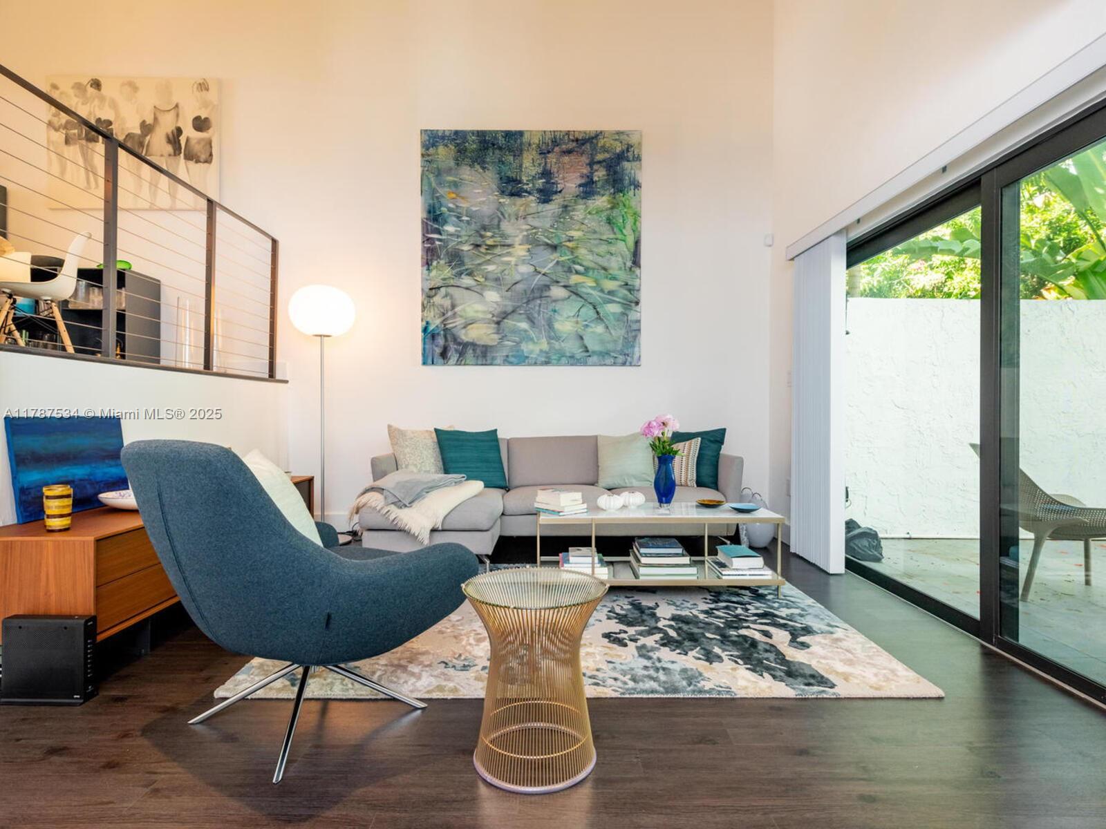 3229 Mary Street, Unit 2 Miami, FL 33133 - Photo 23 of 56 a living room with furniture and a window