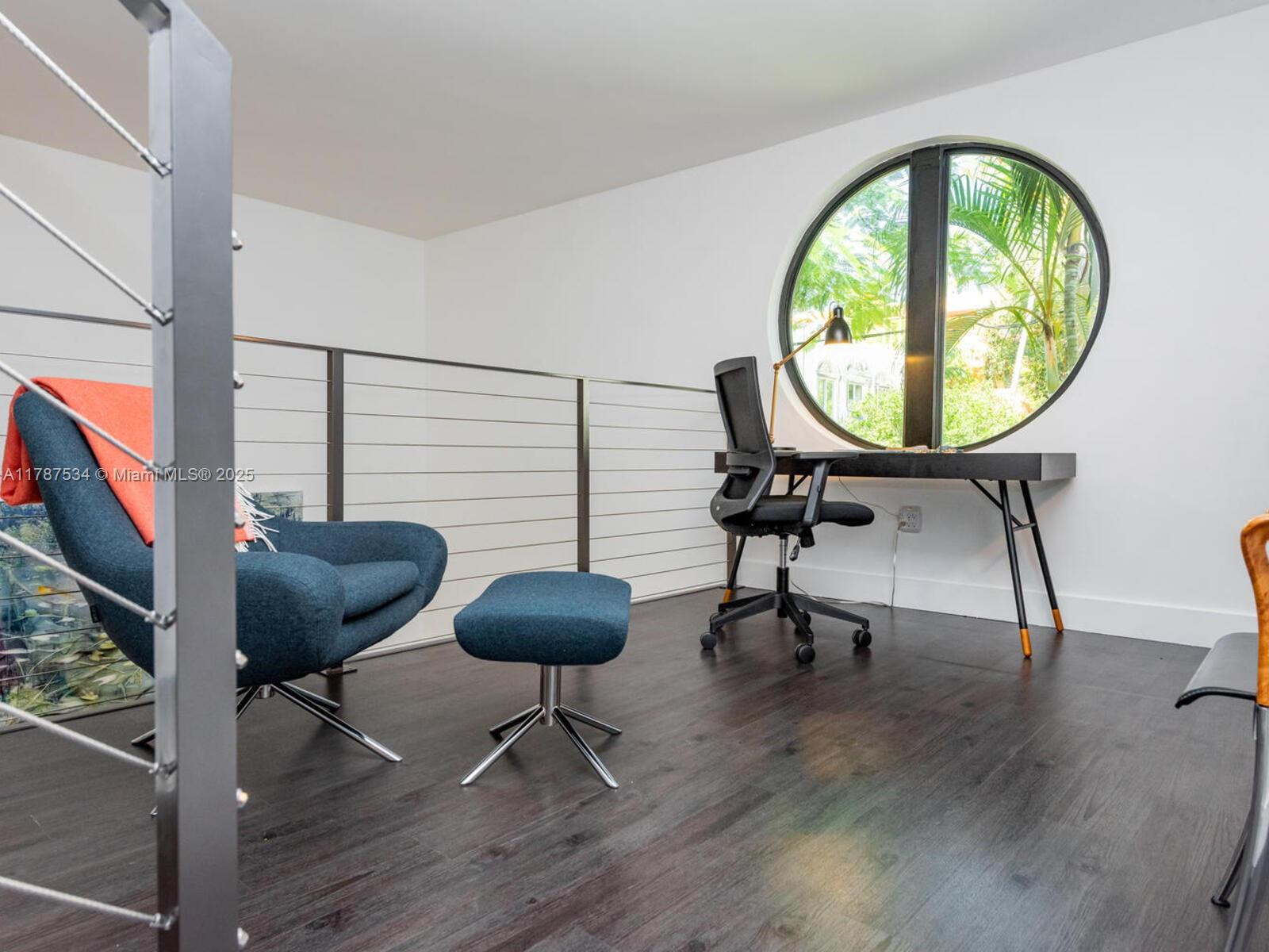 3229 Mary Street, Unit 2 Miami, FL 33133 - Photo 33 of 56 a view of a livingroom with furniture and a painting